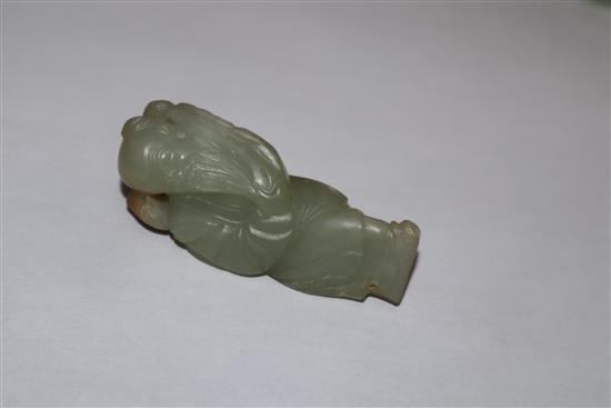 A Chinese carved jade group of two kylin, red lacquered and carved figure of a sage tallest 7cm